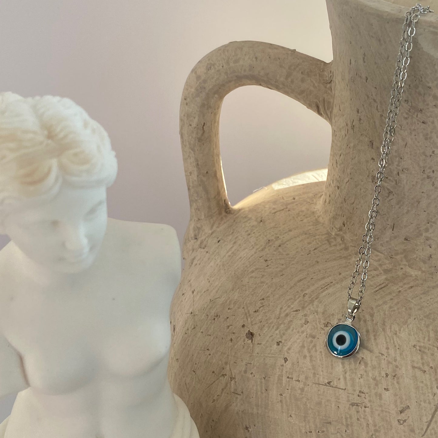 Light Blue Evil Eye Pendant Silver Necklace